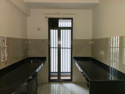 Kitchen Image of 870 Sq.ft 2 BHK Apartment / Flat for sale in Runwal My City Phase II Cluster 5 Part III, Usarghar Thane for Rs. 5600000