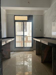 Kitchen Image of 717 Sq.ft 1 BHK Apartment / Flat for sale in Pushpak Nagar Navi Mumbai for Rs. 3800000