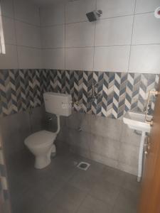Bathroom Image of 750 Sq.ft 2 BHK Apartment / Flat for sale in Swarna Griha 4 Phase 1, Kakati Belagavi for Rs. 3600000