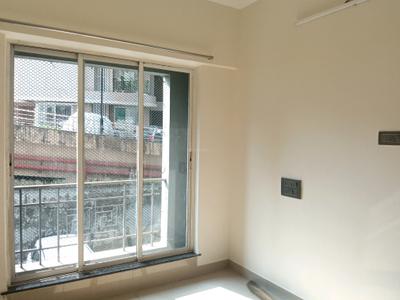 Bedroom Image of 575 Sq.ft 1 BHK Apartment / Flat for rent in Unnati Woods Phase 7, Kasarvadavali Thane for Rs. 18000