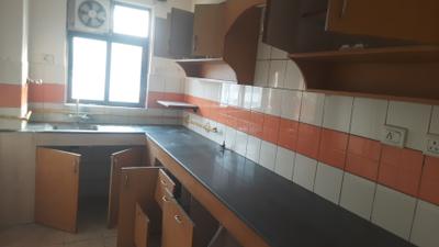 Kitchen Image of 1200 Sq.ft 2 BHK Apartment / Flat for rent in Ashiana Aangan, Milakpur Goojar Bhiwadi for Rs. 18000