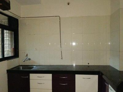 Kitchen Image of 1025 Sq.ft 2 BHK Apartment / Flat for sale in Raunak Unnathi Woods Phase 3, Kasarvadavali Thane for Rs. 9200000