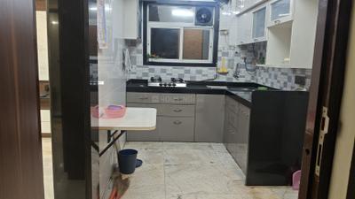 Kitchen Image of 1050 Sq.ft 2 BHK Apartment / Flat for rent in Sanpada Navi Mumbai for Rs. 55000