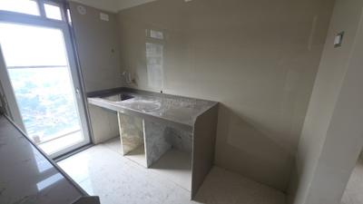 Kitchen Image of 830 Sq.ft 2 BHK Apartment / Flat for rent in Suswagatam CHS Adityaraj Landmark, Vikhroli East Mumbai for Rs. 59500