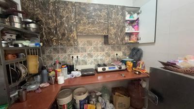 Kitchen Image of 700 Sq.ft 1 BHK Builder Floor for rent in Sector 57 Gurgaon for Rs. 24000