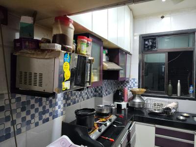 Kitchen Image of 550 Sq.ft 1 BHK Apartment / Flat for rent in Puraniks Home Town E , Kasarvadavali Thane for Rs. 17999