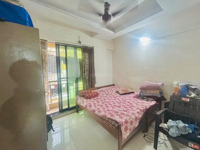 Bedroom Image of 675 Sq.ft 1 BHK Apartment / Flat for rent in Thakurli Thane for Rs. 15000