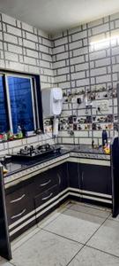 Kitchen Image of 1105 Sq.ft 2 BHK Apartment / Flat for sale in Varni Enterprise Kailash Residency 2, Karadva Gam Surat for Rs. 3000000