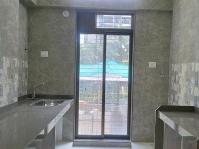 Kitchen Image of 690 Sq.ft 1 BHK Apartment / Flat for rent in Tharwani Rosalie, Kalyan West Kalyan for Rs. 18500