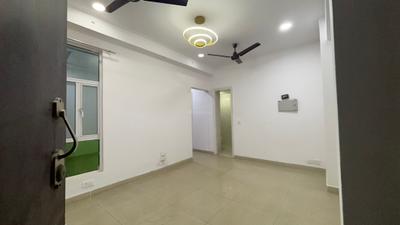 Living Room Image of 820 Sq.ft 2 BHK Apartment / Flat for rent in Gaur City 2 16th Avenue, Noida Extension Greater Noida for Rs. 18000