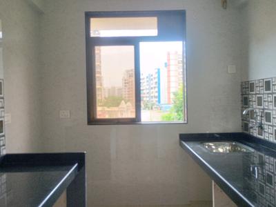 Kitchen Image of 781 Sq.ft 1 BHK Apartment / Flat for sale in Jhalak Fourwings, Ambernath East Ambernath for Rs. 3500000