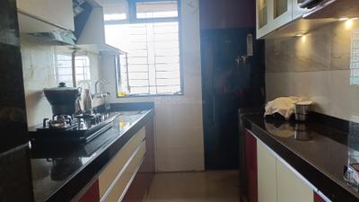 Kitchen Image of 990 Sq.ft 2 BHK Apartment / Flat for sale in Sanghvi Valley, Kalwa Thane for Rs. 13000000