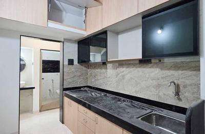 Kitchen Image of Mhada Mig Hig Apartment - Goregaon West in Goregaon West, Mumbai