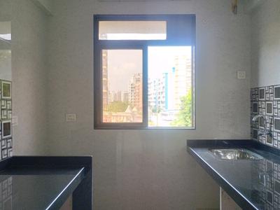 Kitchen Image of 690 Sq.ft 1 BHK Apartment / Flat for sale in Meera Nanda Bliss, Ambernath East Ambernath for Rs. 2399999