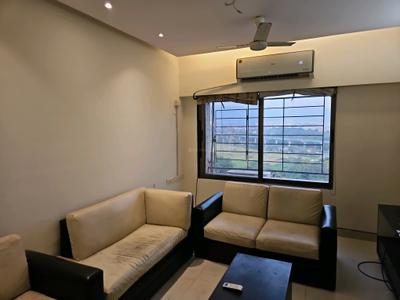 Living Room Image of 584 Sq.ft 1 BHK Apartment / Flat for rent in Ajmera Bhakti Park, Wadala East Mumbai for Rs. 57000