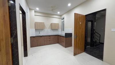 Kitchen Image of 950 Sq.ft 2 BHK Builder Floor for rent in Mahalakshmi Nagar Indore for Rs. 22500