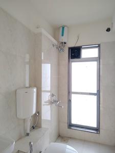 Common Bathroom Image of 700 Sq.ft 1 BHK Apartment / Flat for rent in Rosa Elite, Thane West Thane for Rs. 15002