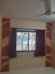 Bedroom Image of 1200 Sq.ft 2 BHK Villa for rent in Padmavati CHS, Dhankawadi Pune for Rs. 18000