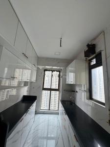 Kitchen Image of 900 Sq.ft 1.5 BHK Apartment / Flat for rent in Lodha Amara, Kolshet Thane for Rs. 27000