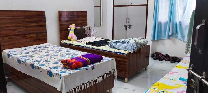 Bedroom Image of Mannat PG Home in Sector 142, Noida