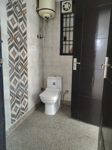 Common Bathroom Image of 700 Sq.ft 2 BHK Builder Floor for rent in Chhattarpur New Delhi for Rs. 22000