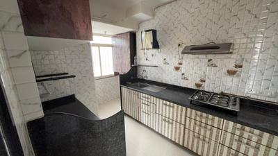 Kitchen Image of 990 Sq.ft 2 BHK Apartment / Flat for rent in Evershine Millennium Paradise, Kandivali East Mumbai for Rs. 65000