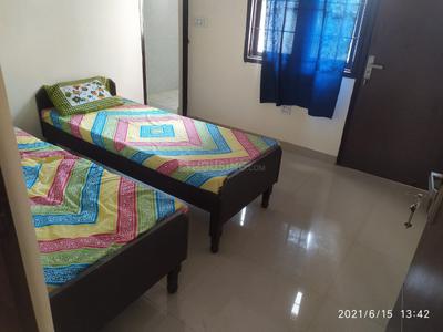Bedroom Image of Living point pg in Sector 61, Noida
