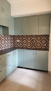 Kitchen Image of 953 Sq.ft 2 BHK Apartment / Flat for rent in Jaypee Kosmos, Sector 134 Noida for Rs. 24500