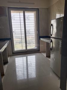 Kitchen Image of 680 Sq.ft 1 BHK Apartment / Flat for sale in Arihant Aarohi, Shilgaon Thane for Rs. 4500000