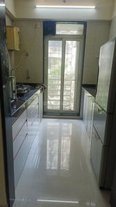 Kitchen Image of 945 Sq.ft 2 BHK Apartment / Flat for sale in RDC Pinewood, Kasarvadavali Thane for Rs. 9500000