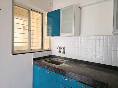 Kitchen Image of 890 Sq.ft 2 BHK Apartment / Flat for rent in Majestique Manhattan, Wagholi Pune for Rs. 20000