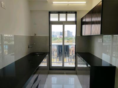Kitchen Image of 754 Sq.ft 1 BHK Apartment / Flat for sale in Shripal Sattva Bldg 2, Vasai West Vasai for Rs. 4650000