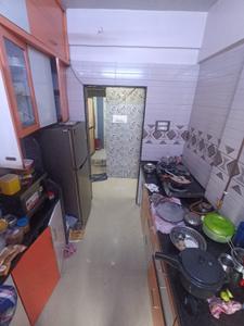Kitchen Image of 672 Sq.ft 1 BHK Apartment / Flat for sale in Shree Chamunda Garden, Thakurli Thane for Rs. 4600000