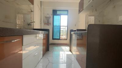 Kitchen Image of 660 Sq.ft 1 BHK Apartment / Flat for sale in Shellproof Gladiolus Tower, Vasai East Vasai for Rs. 4400000