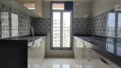 Kitchen Image of 950 Sq.ft 2 BHK Apartment / Flat for sale in Sanghvi S3 Proxima, Chembur Mumbai for Rs. 19000000