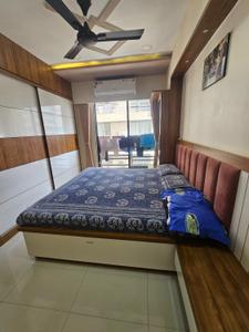 Bedroom Image of 1500 Sq.ft 2 BHK Apartment / Flat for sale in Sarjan Setu Altezza, Tragad Ahmedabad for Rs. 7000000