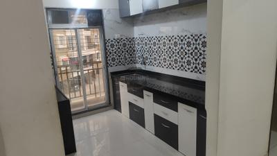 Kitchen Image of 920 Sq.ft 2 BHK Apartment / Flat for sale in Sadguru Nakshtra Phase II, Titwala Thane for Rs. 4100000