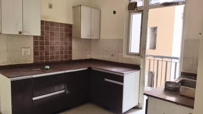 Kitchen Image of 900 Sq.ft 2 BHK Apartment / Flat for sale in Amrapali Zodiac, Sector 120 Noida for Rs. 8900000