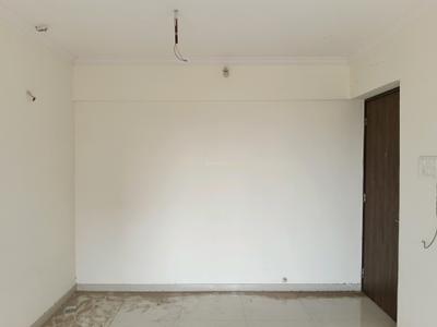 Living Room Image of 640 Sq.ft 1 BHK Apartment / Flat for sale in Raunak Unnathi Woods Phase 3, Kasarvadavali Thane for Rs. 6300000