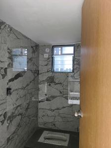 Common Bathroom Image of 839 Sq.ft 2 BHK Apartment / Flat for sale in KGI Kohinoor Highland, Usarghar Thane for Rs. 4750000