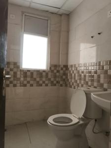 Common Bathroom Image of 1115 Sq.ft 3 BHK Apartment / Flat for sale in NBCC Golf Homes, Noida Extension Greater Noida for Rs. 8400000