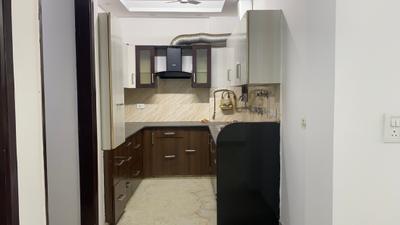 Kitchen Image of 1350 Sq.ft 3 BHK Builder Floor for rent in Janakpuri New Delhi for Rs. 47000