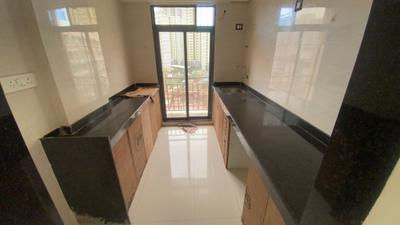 Kitchen Image of 860 Sq.ft 2 BHK Apartment / Flat for rent in Naman Platina, Taloja Navi Mumbai for Rs. 17000