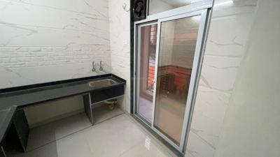 Kitchen Image of 850 Sq.ft 2 BHK Apartment / Flat for sale in Shreeji Krishna Nayan Complex Phase I, Badlapur East Badlapur for Rs. 3455000