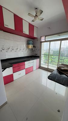 Kitchen Image of 950 Sq.ft 2 BHK Apartment / Flat for sale in Manohar Shreeji Nirvana II, Badlapur East Badlapur for Rs. 4000000