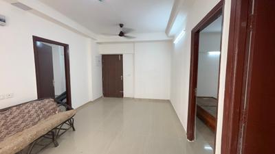 Living Room Image of 1100 Sq.ft 2.5 BHK Apartment / Flat for sale in Amrapali Verona Heights, Noida Extension Greater Noida for Rs. 8045000