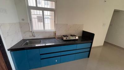 Kitchen Image of 600 Sq.ft 2 BHK Apartment / Flat for rent in Kolte Patil Life Republic Sector R16 16th Avenue Arezo M Building, Marunji Pune for Rs. 25000