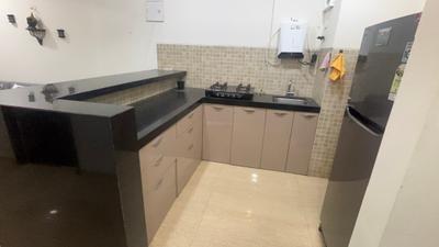 Kitchen Image of 705 Sq.ft 1 BHK Apartment / Flat for sale in Lodha Belmondo, Gahunje Pune for Rs. 7700000