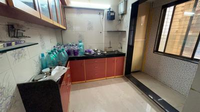 Kitchen Image of 560 Sq.ft 1 BHK Apartment / Flat for sale in Suyash Tower, Kopar Khairane Navi Mumbai for Rs. 9900000