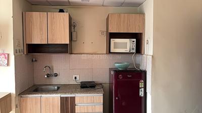 Kitchen Image of 450 Sq.ft 1 RK Apartment / Flat for rent in Supertech Eco Suites, Sector 137 Noida for Rs. 19000